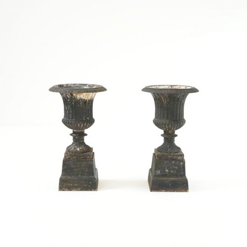 PAIR OF CAST IRON CAMPANA URNS ON PLINTHS