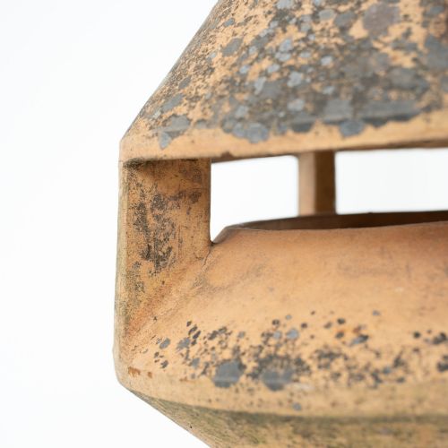 fig 5. A late Victorian buff terracotta exhaust cowl chimney pot featuring a vented cap and pointed finial top.