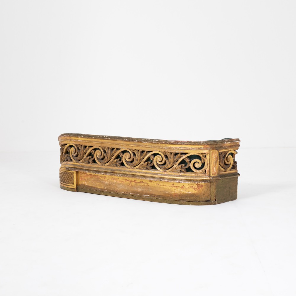 A 19th-century carved giltwood jardiniere featuring pierced scrolling acanthus motifs and a low curved profile. View II