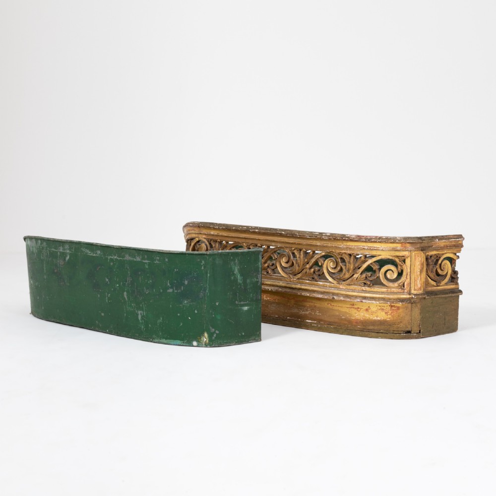 A 19th-century carved giltwood jardiniere featuring pierced scrolling acanthus motifs and a low curved profile. View IV