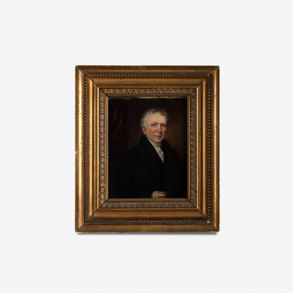 A 19th-century oil portrait of a gentleman in a dark coat, housed in a wide gilt decorative frame.