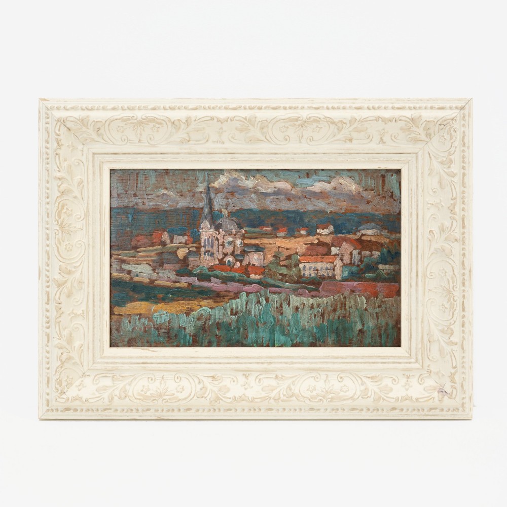 An oil painting on wooden panel depicting a European townscape with a central church spire, set within an off-white carved decorative frame.