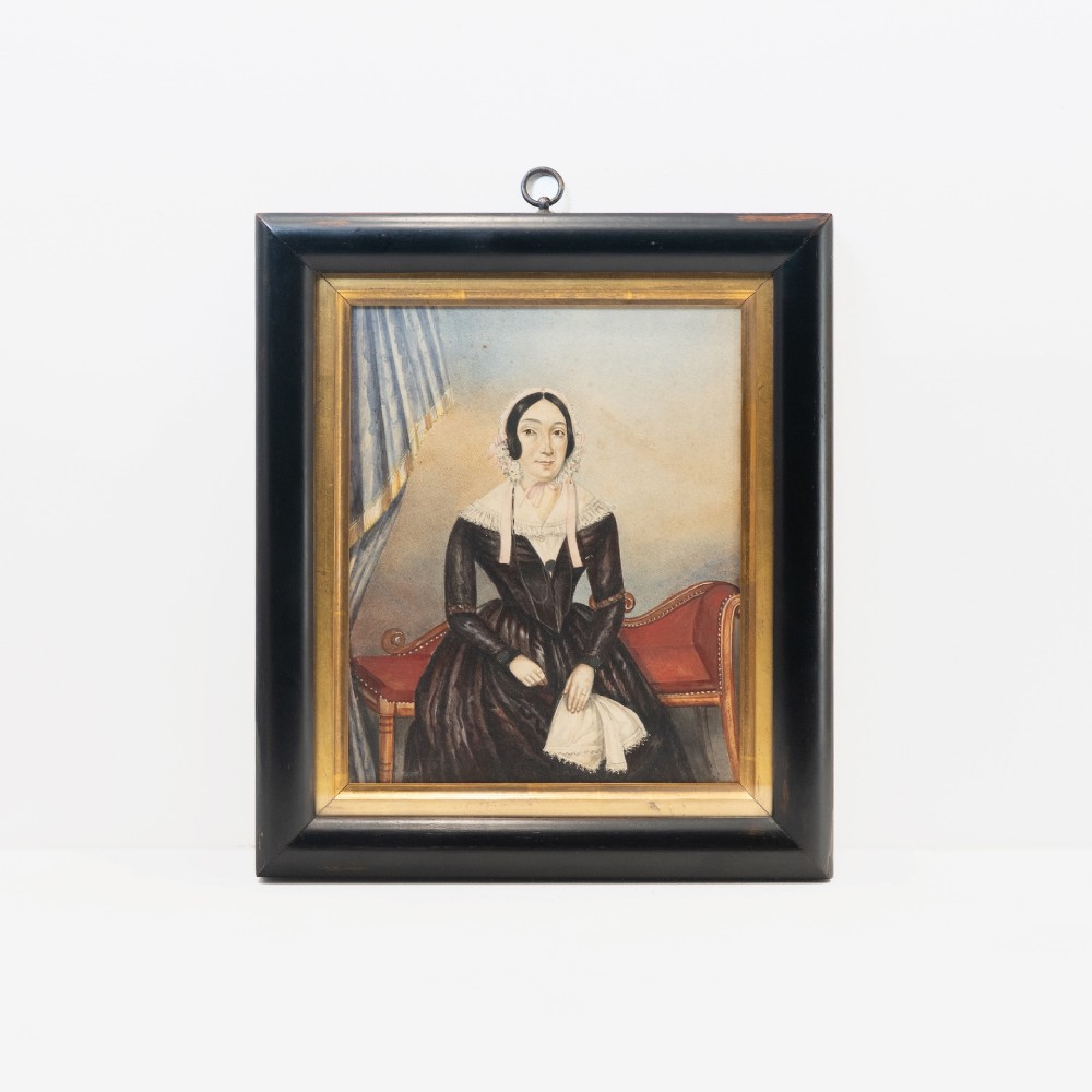 A pair of mid-19th century framed folk art portraits depicting a seated woman and man in period clothing. View III