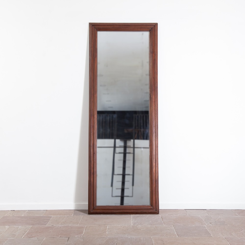 A tall rectangular 19th-century mirror featuring a dark brown moulded walnut wood frame. View II