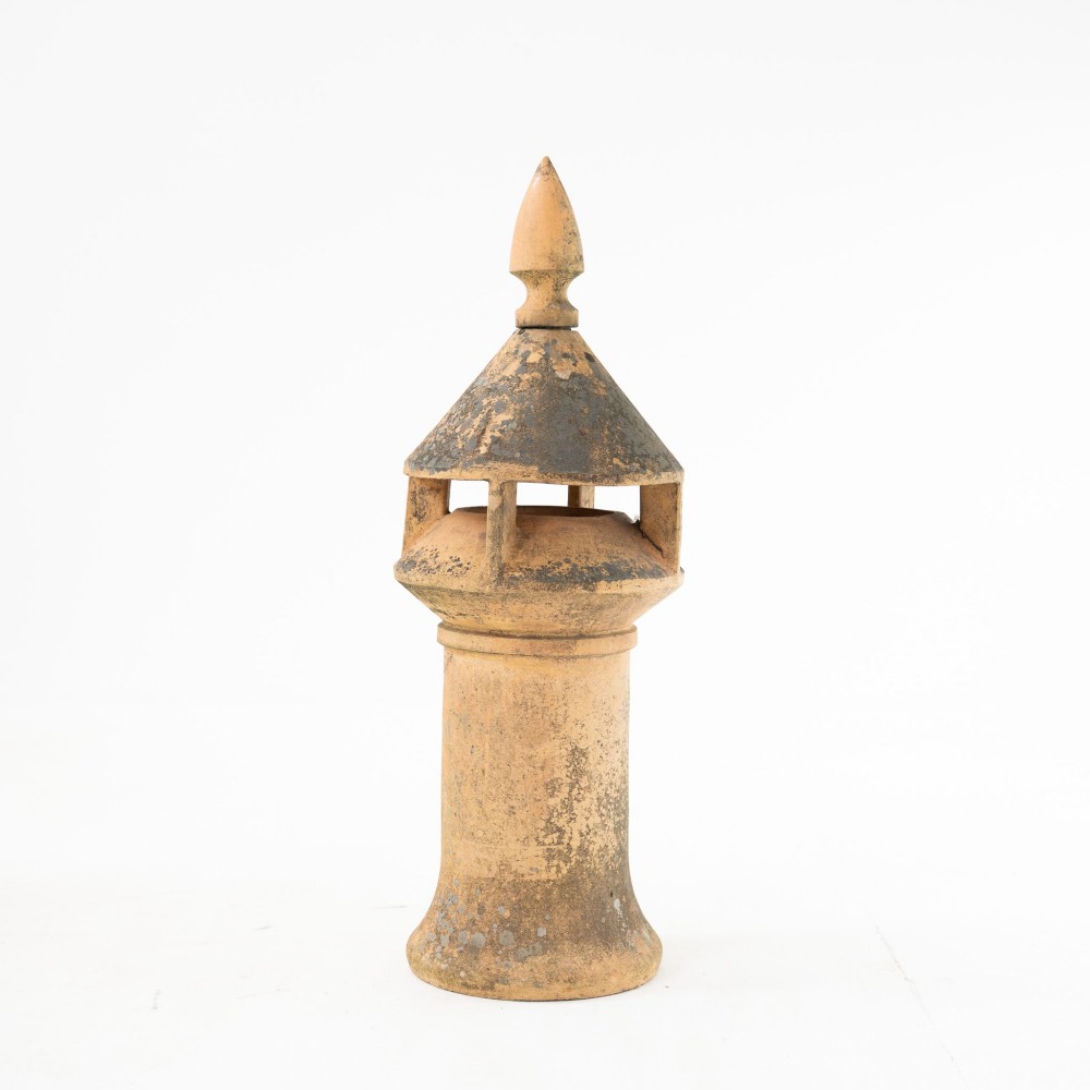 A late Victorian buff terracotta exhaust cowl chimney pot featuring a vented cap and pointed finial top. View II