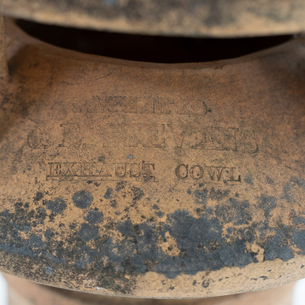 A late Victorian buff terracotta exhaust cowl chimney pot featuring a vented cap and pointed finial top. View VII