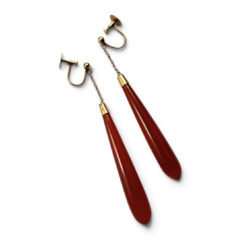A pair of antique Edwardian drop earrings featuring long, polished teardrop-shaped carnelian stones suspended from delicate 9ct gold chains. View III