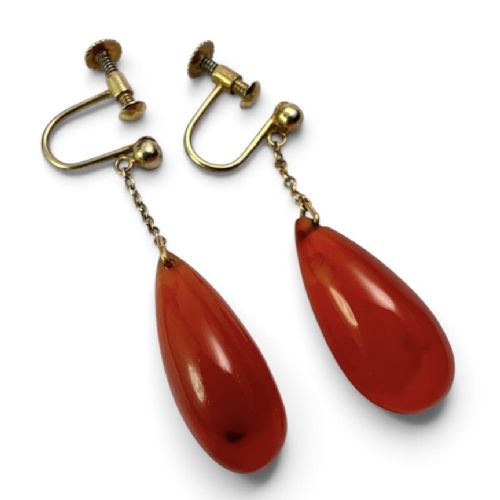 Pair of Edwardian 9ct gold screw-back earrings featuring delicate chains suspending polished teardrop-shaped red agate drops. View III