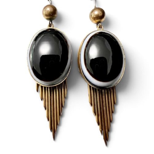 A pair of Victorian drop earrings featuring oval bullseye agate cabochons set in gold frames with graduating metallic fringe spikes below. View II