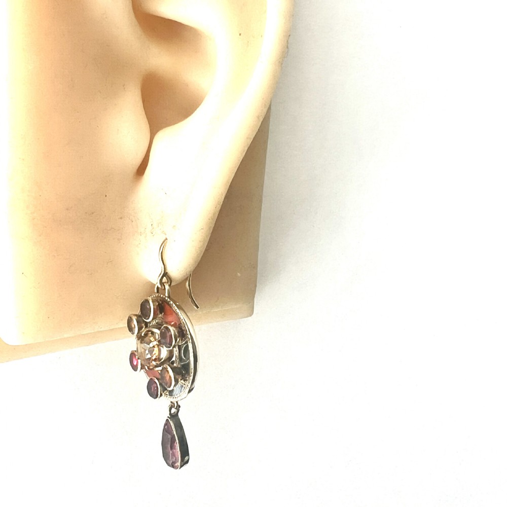 A pair of Victorian 9ct gold target drop earrings inlaid with patterned agates and surrounding central citrine gemstones. View VIII