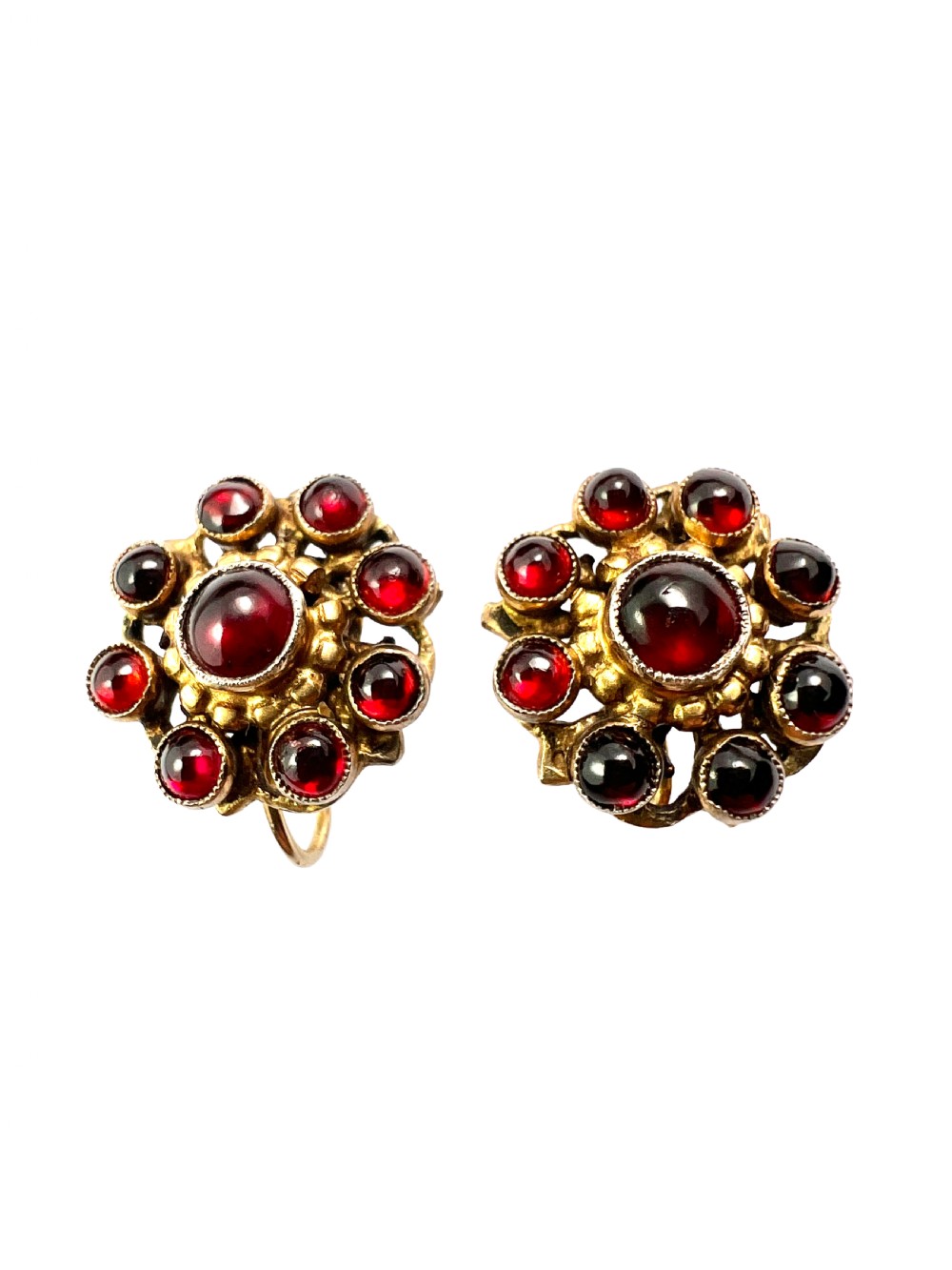 A pair of antique silver-gilt earrings set with deep red cabochon garnets arranged in a circular cluster halo design. View III