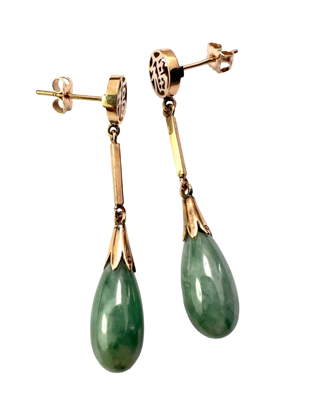 A pair of gold drop earrings featuring circular tops with pierced Chinese characters, slender gold bar links, and teardrop-shaped green jade stones. View IV