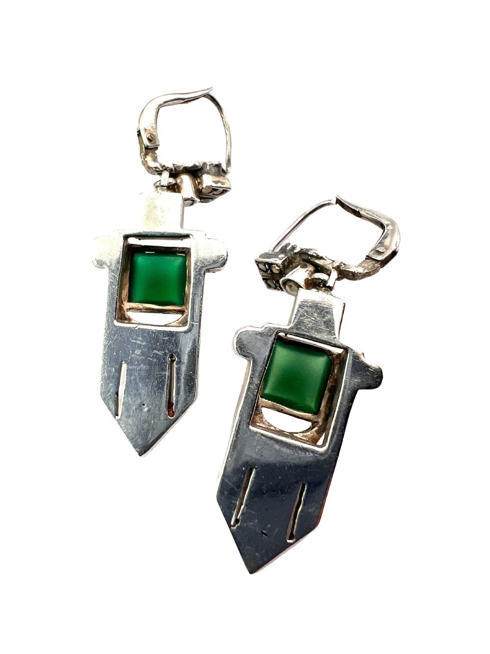 A pair of silver Art Deco drop earrings featuring square green chrysoprase cabochons within geometric stepped frames set with marcasite stones. View V