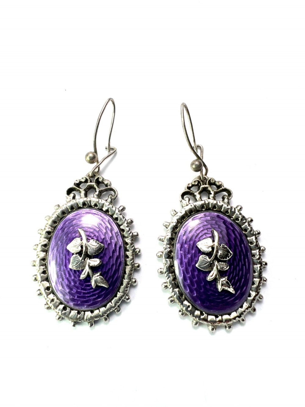 A matching silver jewellery set featuring purple guilloche enamel panels decorated with silver leaf motifs, including drop earrings, a ring, and an articulated link bracelet. View II
