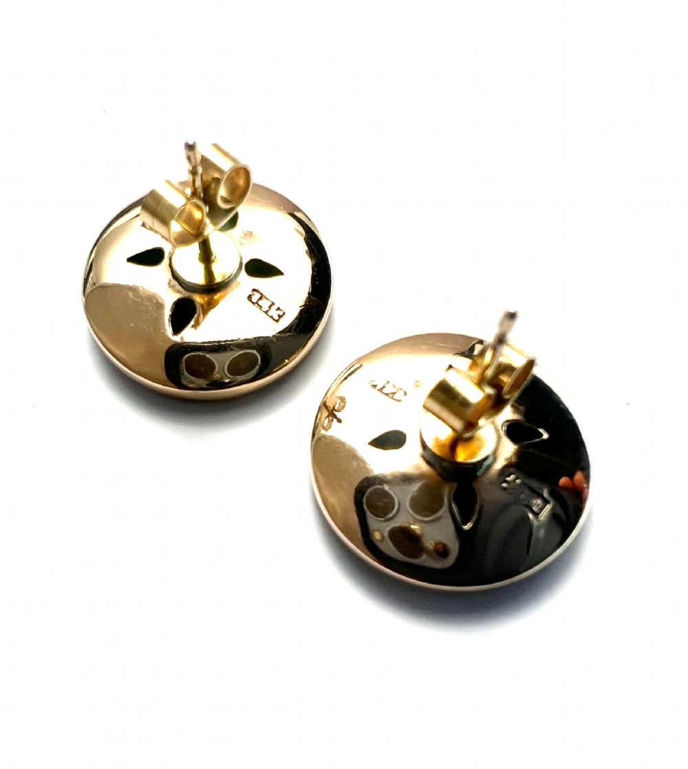 Pair of circular green jade torus stud earrings with central fourteen-carat gold character medallions. View V