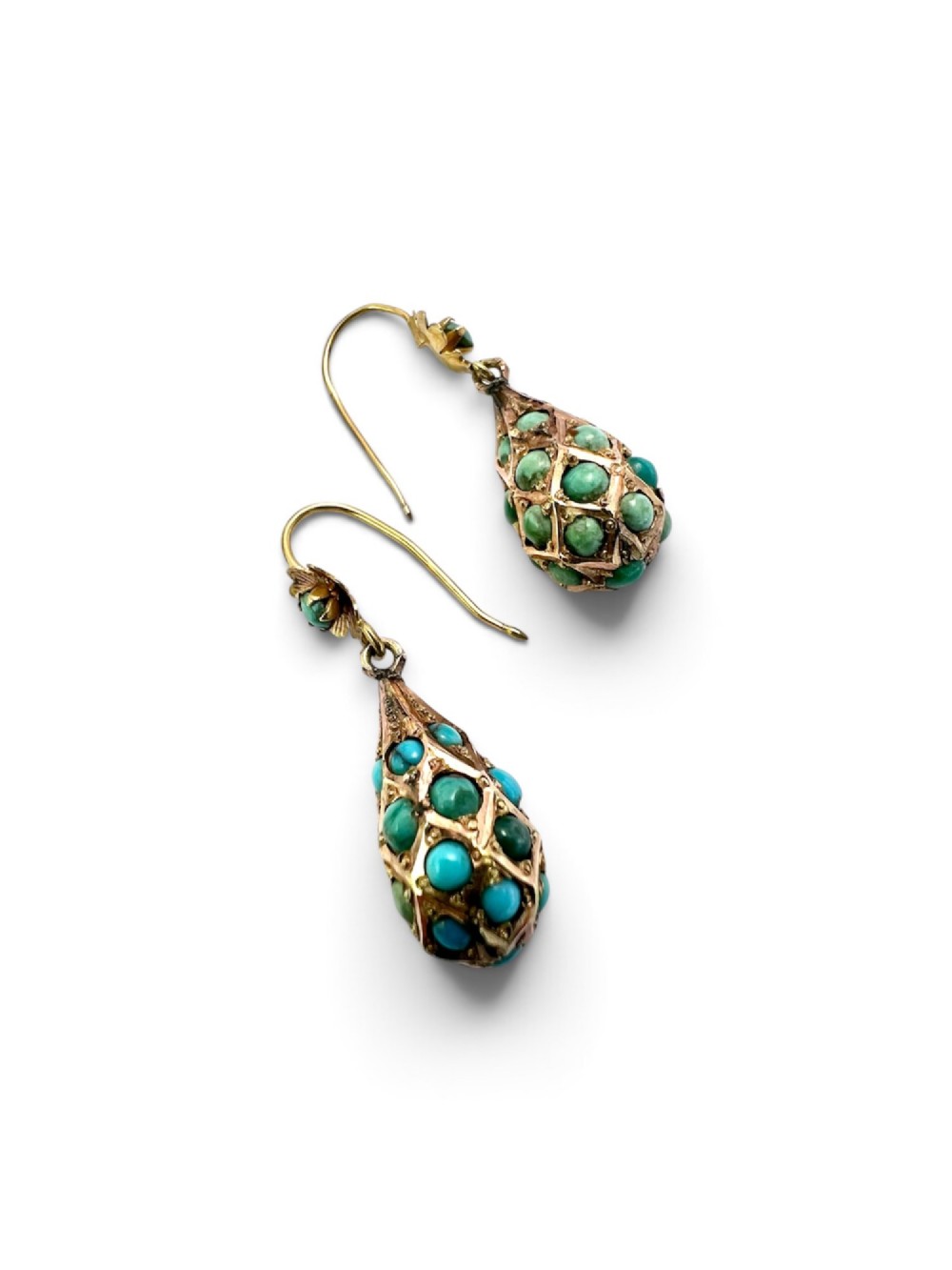 A pair of Victorian gold drop earrings featuring floral tops and lattice-engraved teardrop pendants set with turquoise cabochon stones. View V