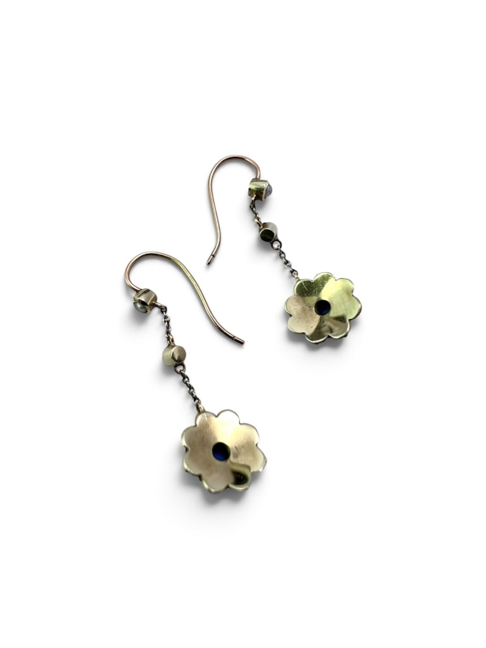 A pair of Edwardian gold drop earrings featuring floral cluster pendants set with central turquoise cabochons surrounded by pearls. View V