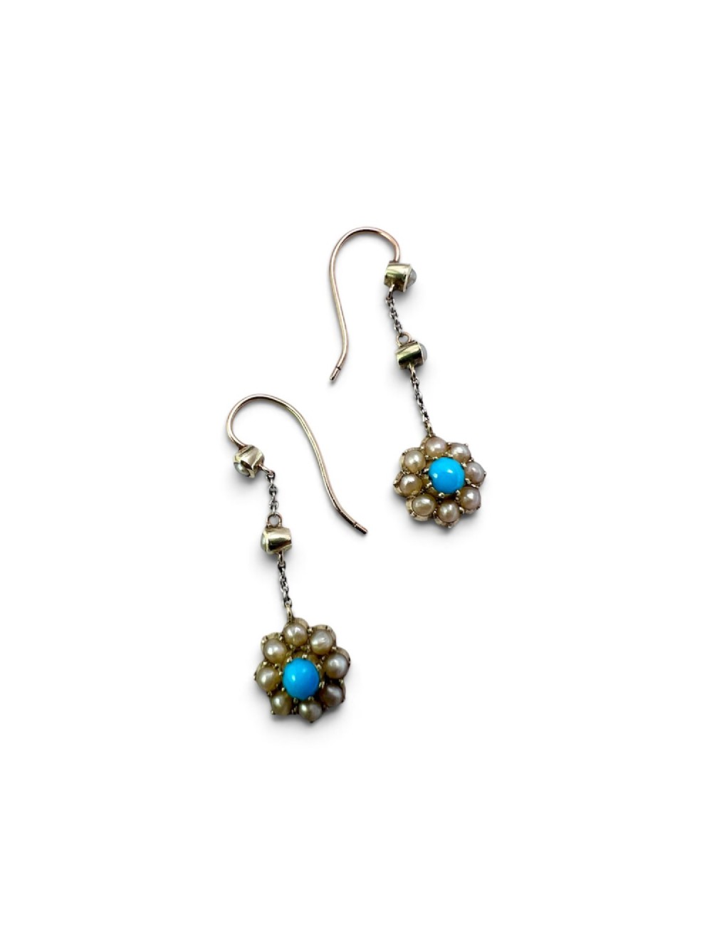 A pair of Edwardian gold drop earrings featuring floral cluster pendants set with central turquoise cabochons surrounded by pearls. View VI