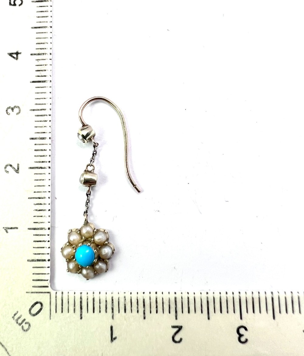 A pair of Edwardian gold drop earrings featuring floral cluster pendants set with central turquoise cabochons surrounded by pearls. View VII
