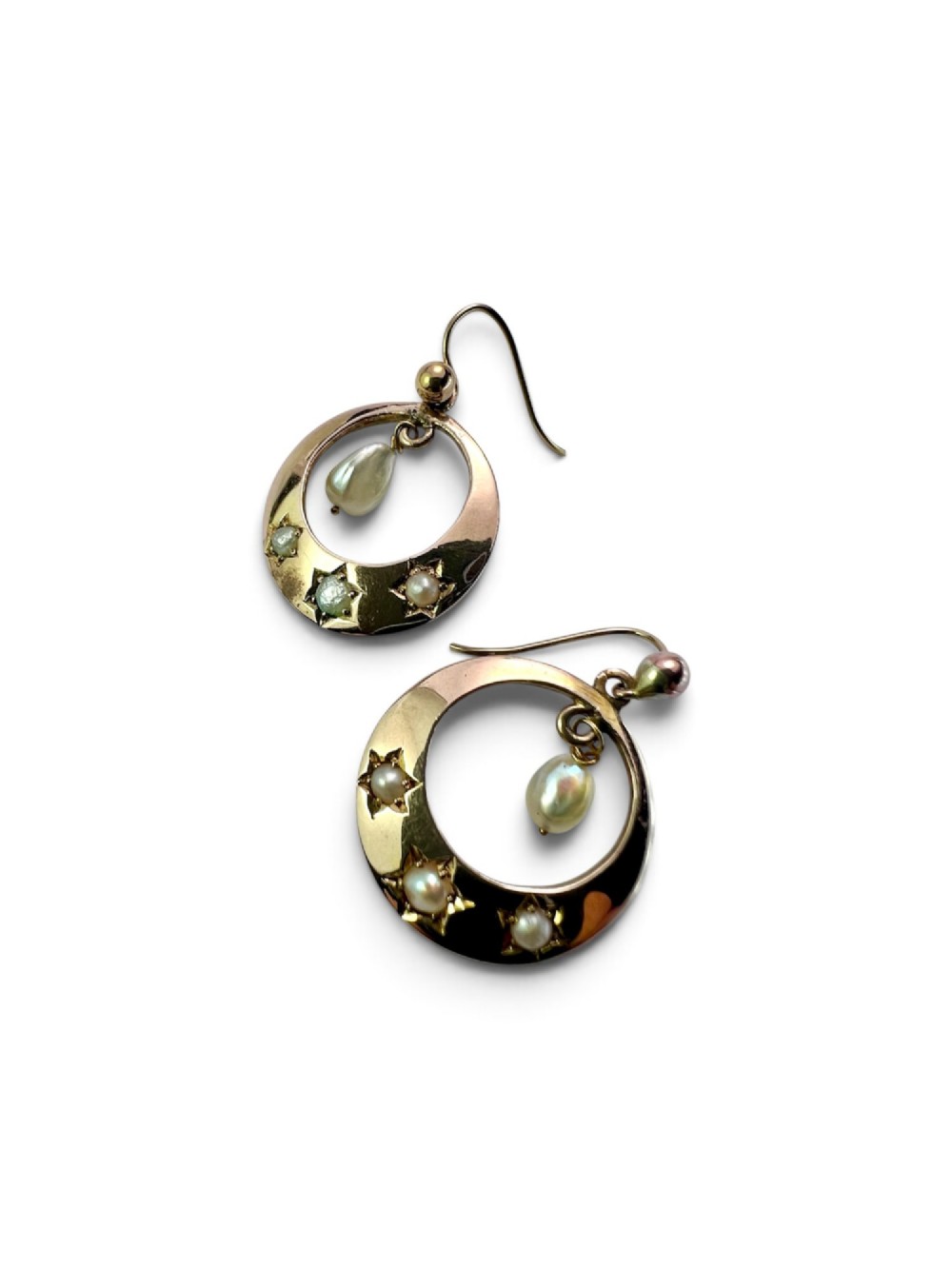 A pair of yellow gold Victorian crescent drop earrings featuring star-set seed pearls and a suspended central pearl drop. View IV