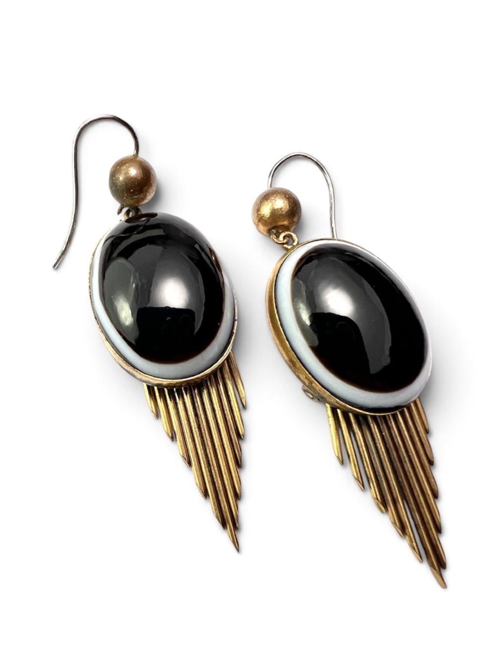 A pair of Victorian drop earrings featuring oval bullseye agate cabochons set in gold frames with graduating metallic fringe spikes below. View IV
