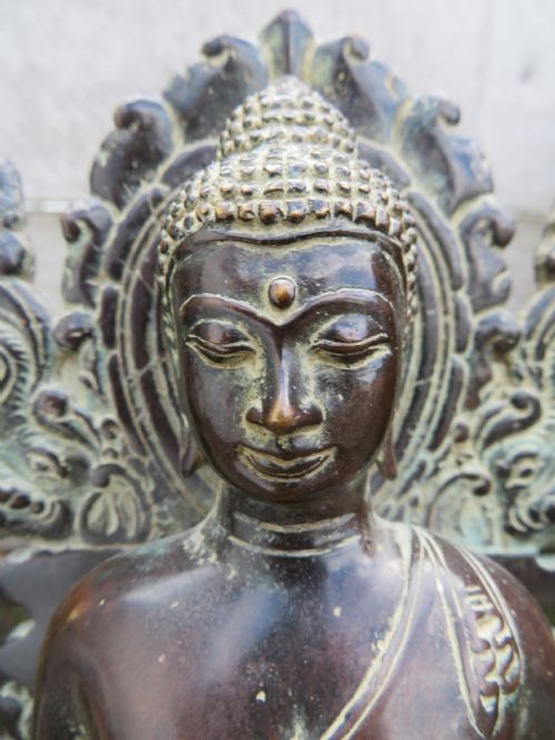 A COPPER ALLOY SEATED FIGURE OF BUDDHA IN THE EUROPEAN FASHION INDONESIAN ARCHIPELAGOCENTRAL JAVA CIRCA EARLY 15TH CENTURY - ADDITIONAL PHOTO 1