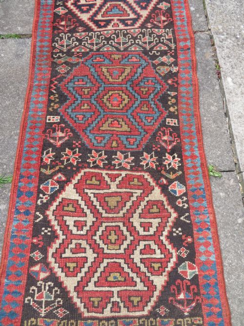 INTERIOR DESIGNEARLY ANTIQUE KURDISH NARROW RUNNERRUG NORTH WEST PERSIACIRCA 1860S 282CM X 74CM - ADDITIONAL PHOTO 3