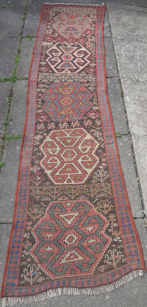 INTERIOR DESIGNEARLY ANTIQUE KURDISH NARROW RUNNERRUG NORTH WEST PERSIACIRCA 1860S 282CM X 74CM - ADDITIONAL PHOTO 16
