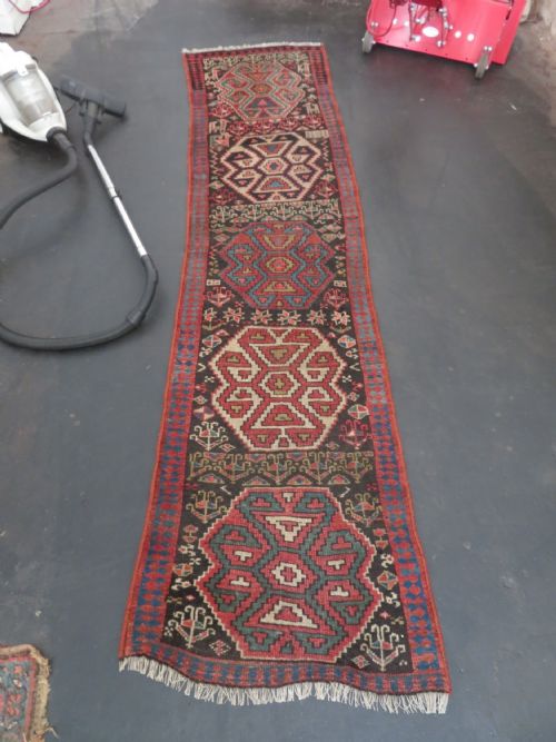 INTERIOR DESIGNEARLY ANTIQUE KURDISH NARROW RUNNERRUG NORTH WEST PERSIACIRCA 1860S 282CM X 74CM - ADDITIONAL PHOTO 26