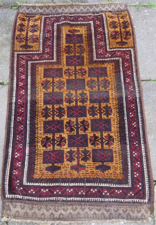 ANTIQUE BALUCH CAMEL GROUND PRAYER RUG BALUCH TRIBES OF HERAT 2ND HALF 19TH CENTURY138CM X 84CM