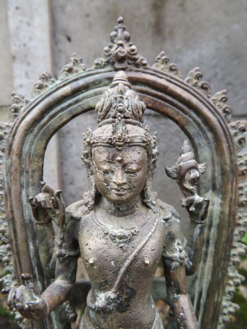 A SILVER AND COPPER ALLOY FIGURE OF VISHNU JAVA12TH13TH CENTURY - ADDITIONAL PHOTO 1