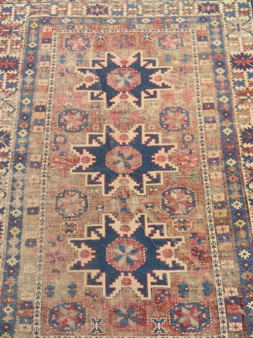 fig 1. DISTRESSED ANTIQUE CAUCASIAN DAGHESTAN RUG. 135CM X 116CM