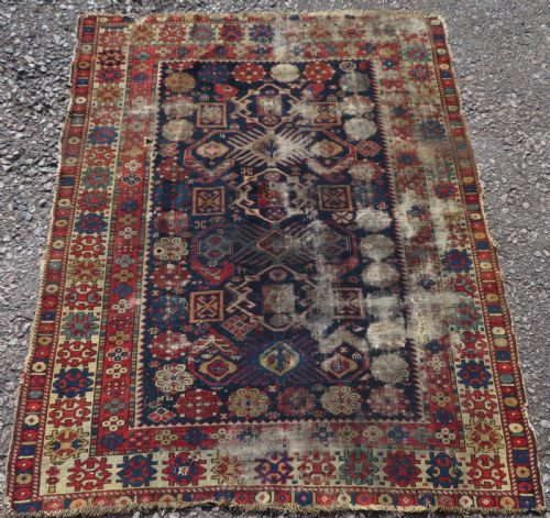 DISTRESSED ANTIQUE CAUCASIAN DAGHESTAN RUG 142CM X 117CM