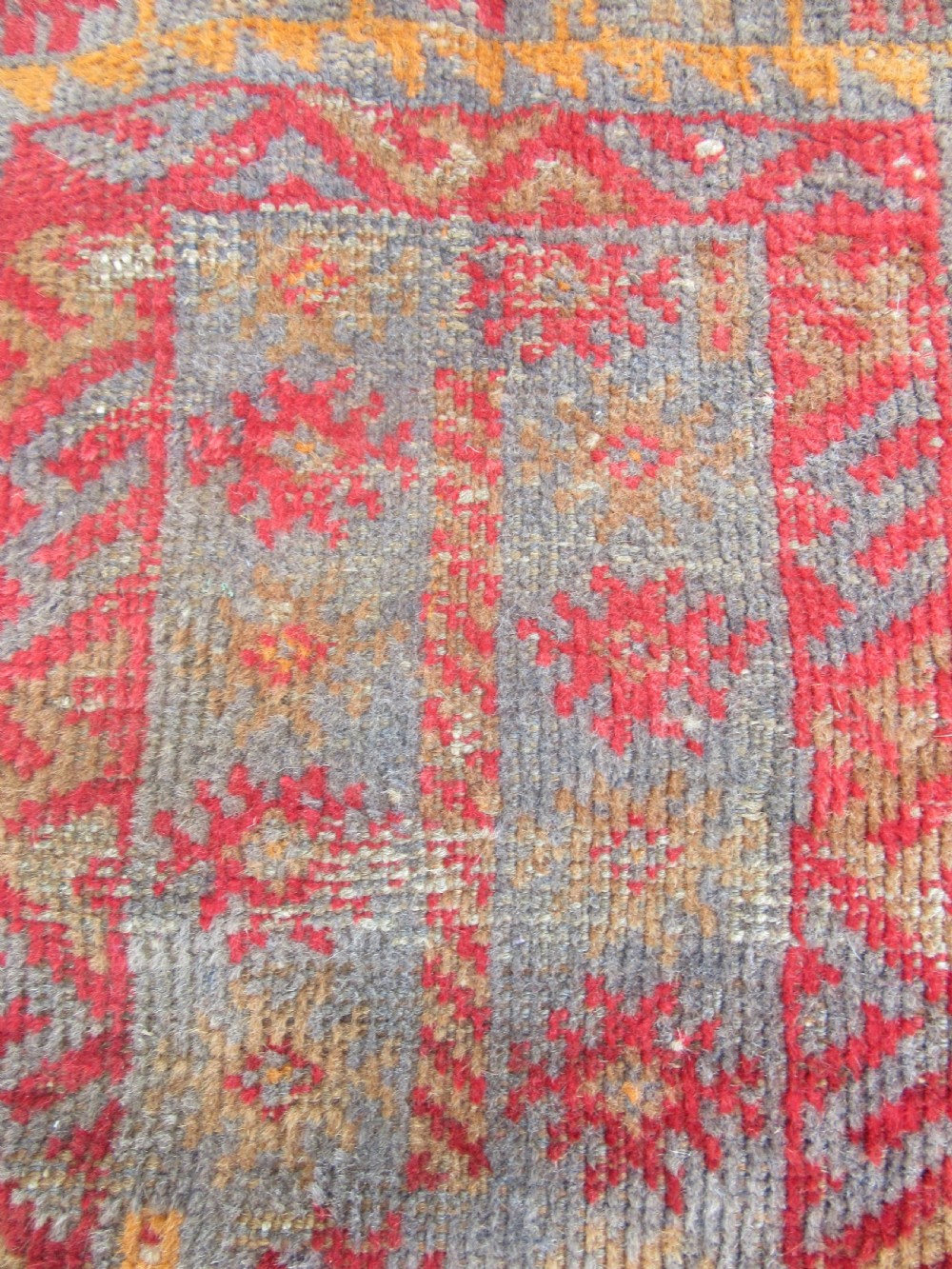 A GROUP OF THREE SMALL OLD BALUCH SCATTER RUGS. GREAT FOR SCATTERING OVER LARGER RUG View VI