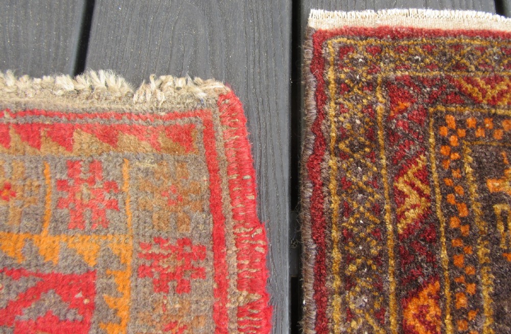 A GROUP OF THREE SMALL OLD BALUCH SCATTER RUGS. GREAT FOR SCATTERING OVER LARGER RUG View IX