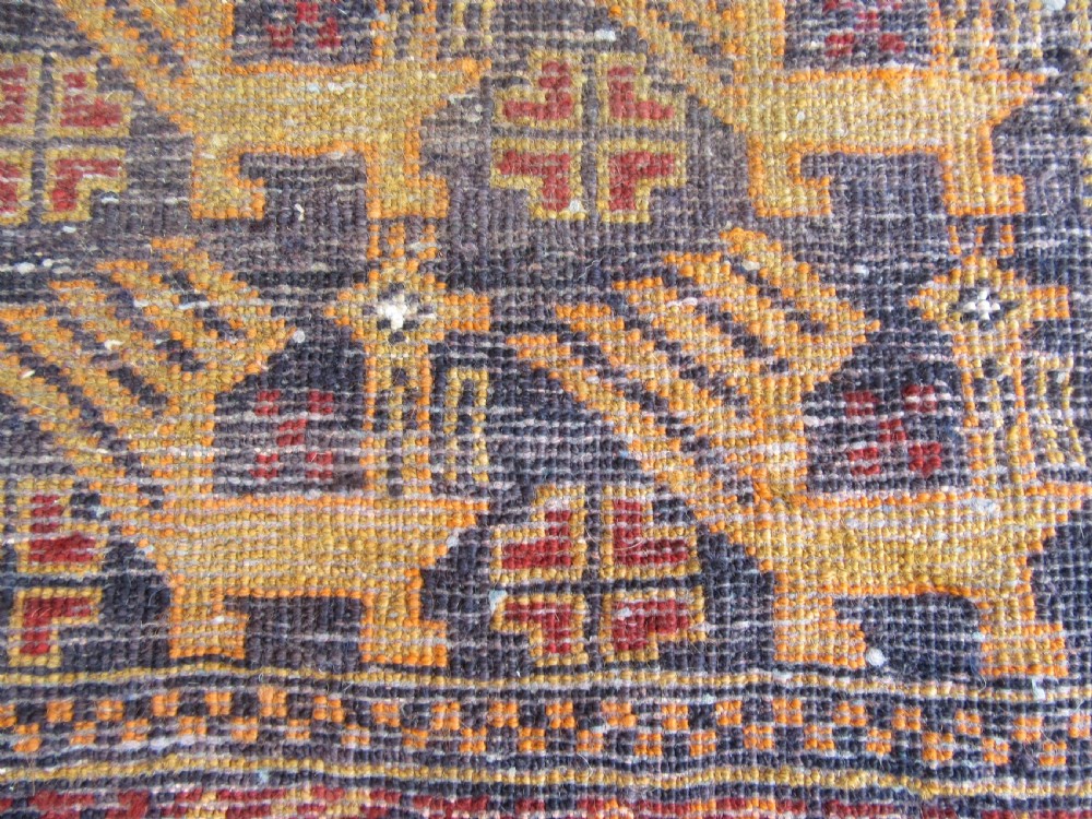 A GROUP OF THREE SMALL OLD BALUCH SCATTER RUGS. GREAT FOR SCATTERING OVER LARGER RUG View XIII