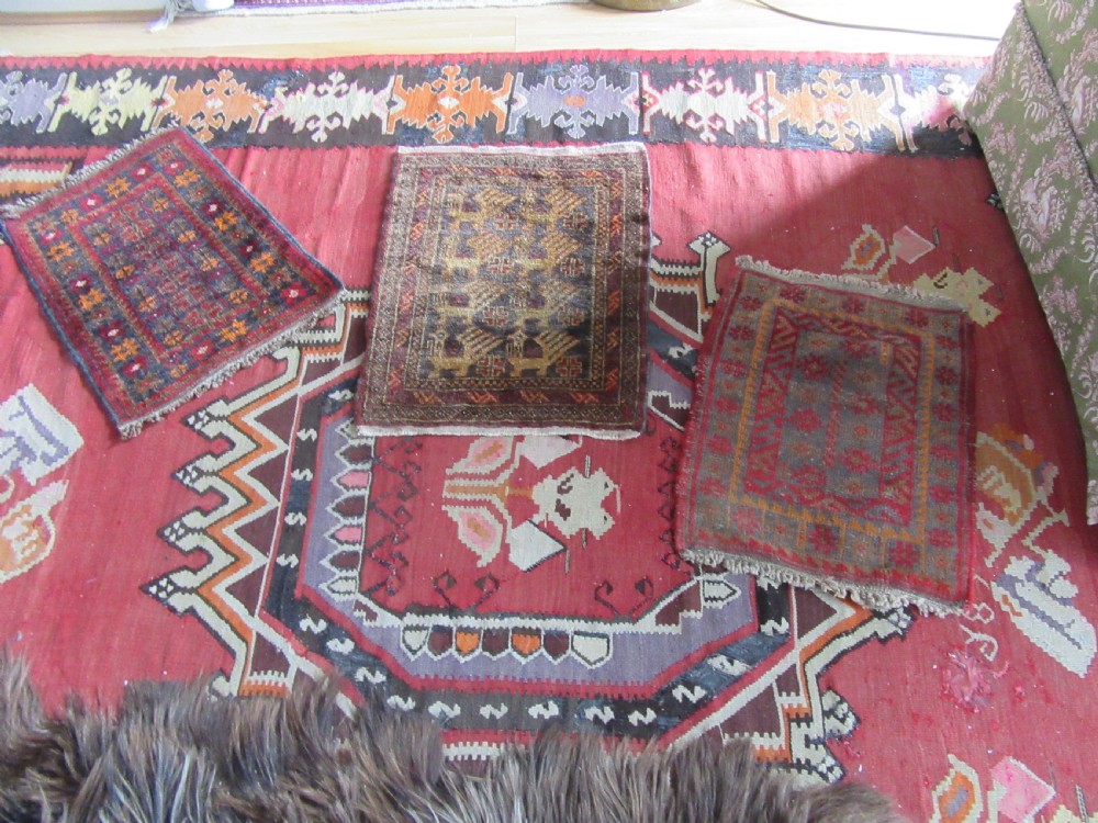 A GROUP OF THREE SMALL OLD BALUCH SCATTER RUGS. GREAT FOR SCATTERING OVER LARGER RUG View XVI