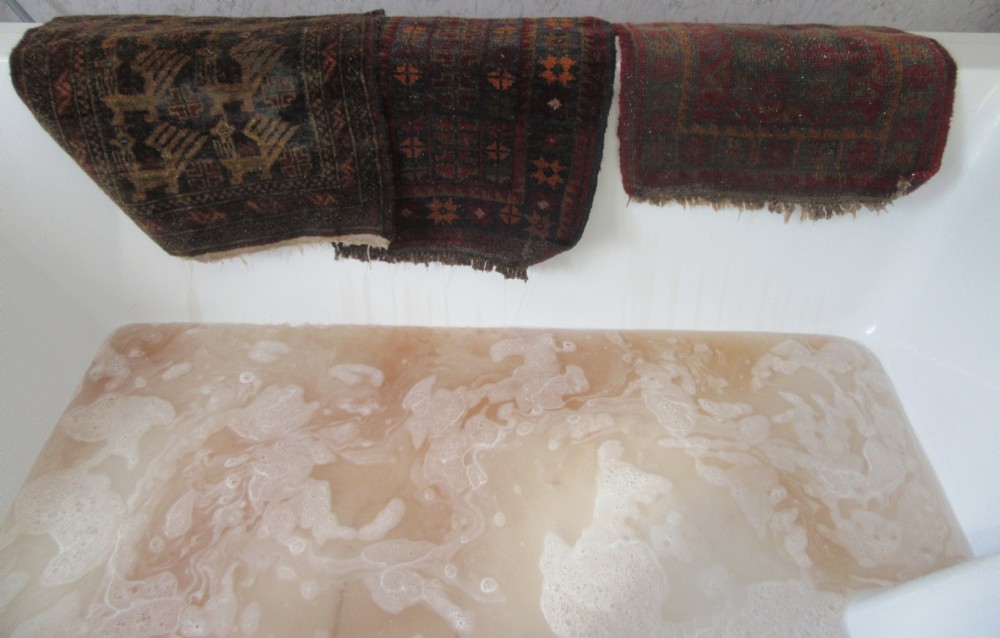A GROUP OF THREE SMALL OLD BALUCH SCATTER RUGS. GREAT FOR SCATTERING OVER LARGER RUG View XVIII