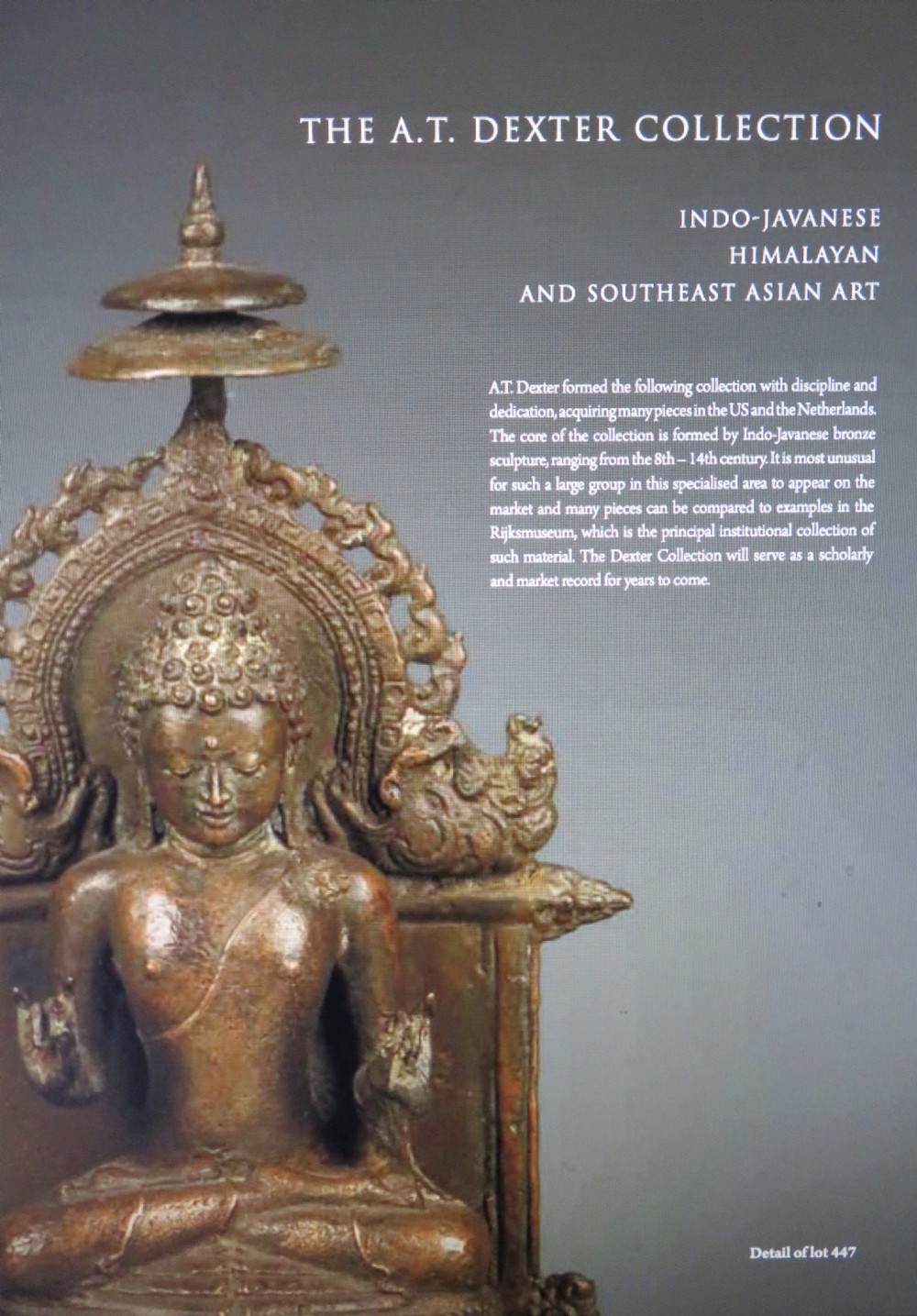 A standing gilded metal statue of a deity on a lotus base holding a lotus stem with an ornate crown and detailed jewellery. View XXI