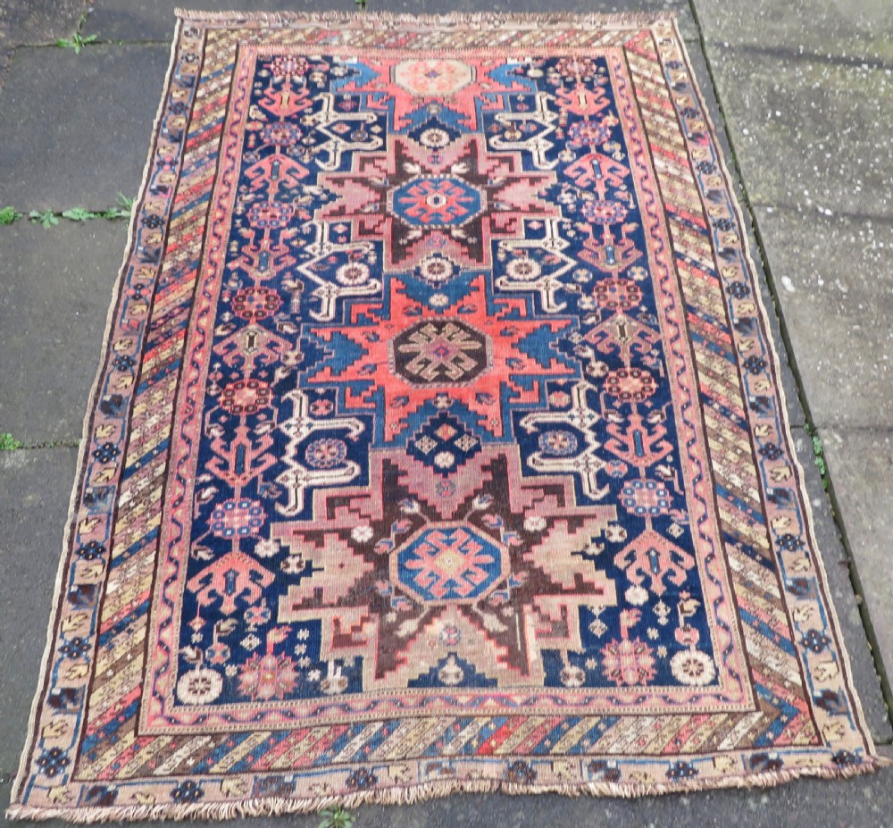 ANTIQUE CAUCASIAN DAGHESTAN LESGHISTAN RUG.UNUSUAL FILLER ORNAMENTS.193CM X 140CM.