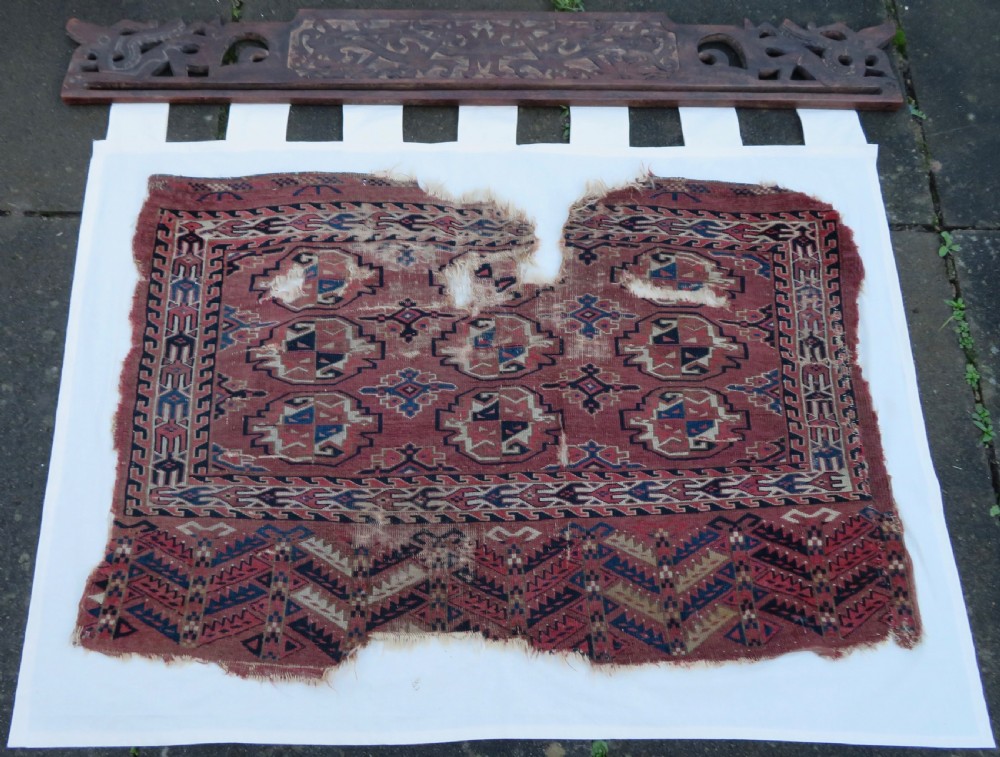 COLLECTABLE ARCHAIC ANTIQUE YOMUT TURKMEN CHUVAL. RUG DISPLAY. CIRCA 1800.