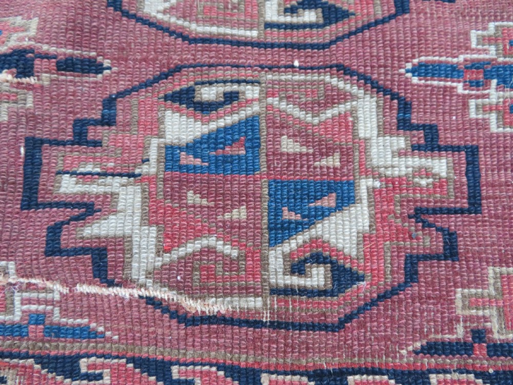 COLLECTABLE ARCHAIC ANTIQUE YOMUT TURKMEN CHUVAL. RUG DISPLAY. CIRCA 1800. View IV