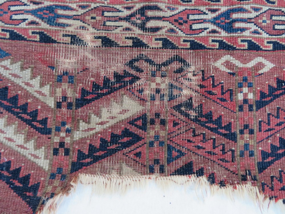 COLLECTABLE ARCHAIC ANTIQUE YOMUT TURKMEN CHUVAL. RUG DISPLAY. CIRCA 1800. View V