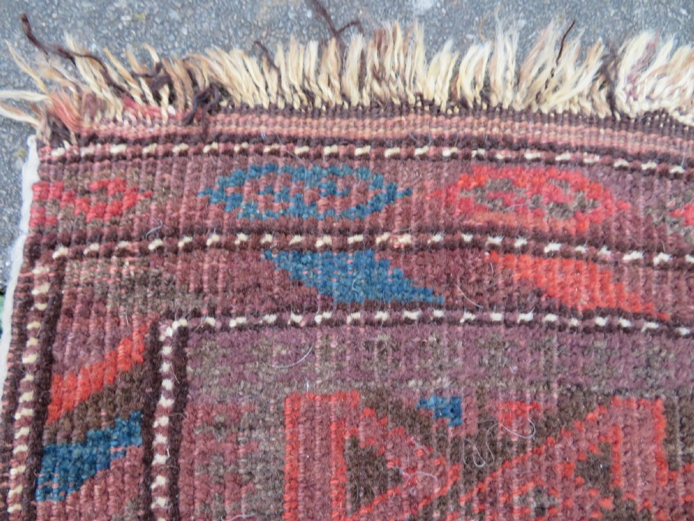 2 X ANTIQUE DISTRESSED BALUCH RUGS. NORTH EAST PERSIA. 118CM X 82CM. 88CM X 64CM. View V
