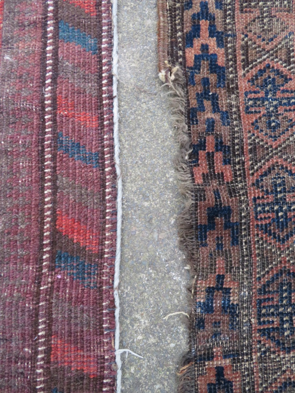 2 X ANTIQUE DISTRESSED BALUCH RUGS. NORTH EAST PERSIA. 118CM X 82CM. 88CM X 64CM. View VIII
