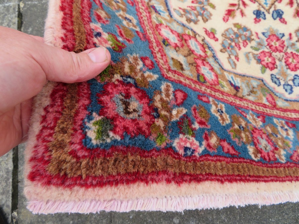 ATTRACTIVE OLD KERMAN (KIRMAN) RUG WITH FLORAL FESTOONS. SOUTH CENTRAL PERSIA. 155CM X 89CM. View V