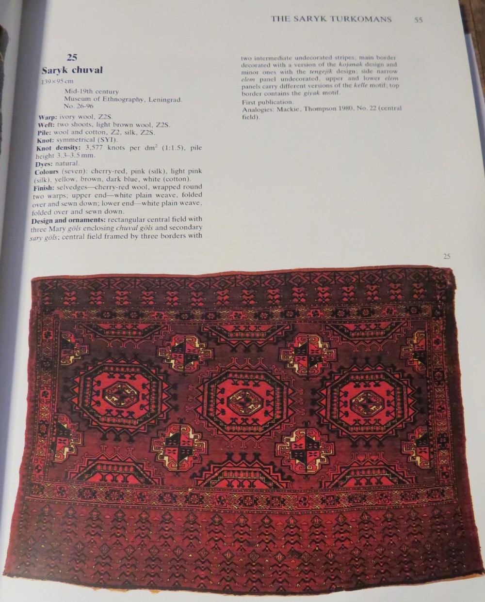 A mid-nineteenth-century hand-knotted Tekke Turkmen wool chuval face featuring six octagonal guls on a deep crimson ground with an intricate bottom elem border. View XXI