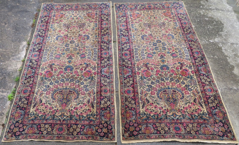 PAIR ANTIQUE IVORY GROUND FLORAL KERMAN KIRMAN RUGS. SOUTH PERSIA. 174CM X 90CM.