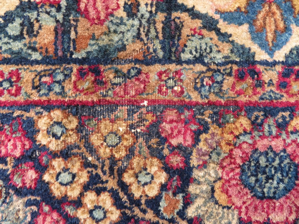 PAIR ANTIQUE IVORY GROUND FLORAL KERMAN KIRMAN RUGS. SOUTH PERSIA. 174CM X 90CM. View VII