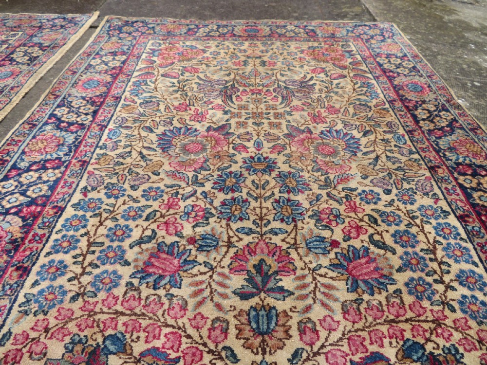 PAIR ANTIQUE IVORY GROUND FLORAL KERMAN KIRMAN RUGS. SOUTH PERSIA. 174CM X 90CM. View VIII